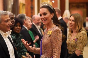 Kate Middleton conversing with guests, wearing a beaded gown and tiara, at a formal event