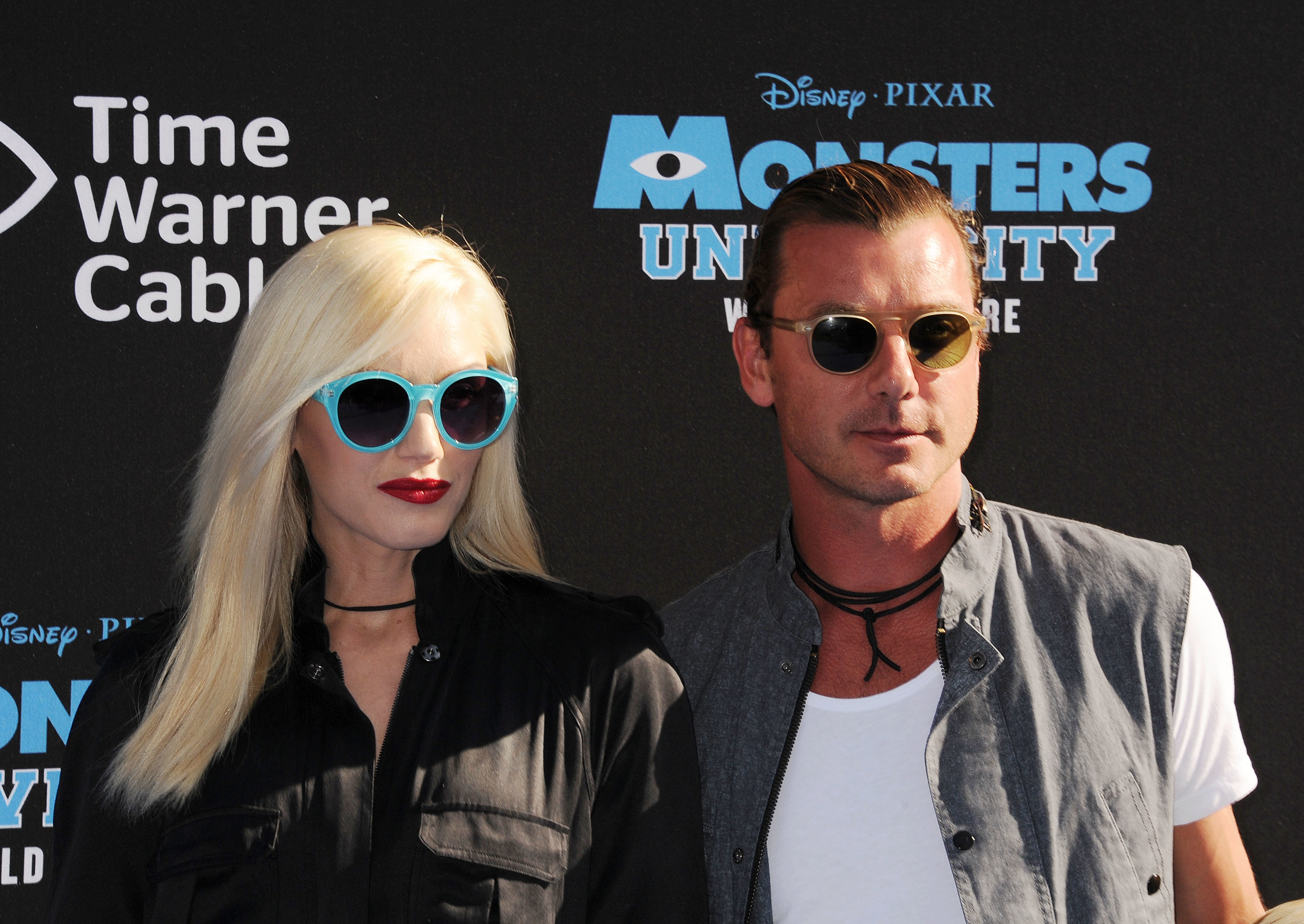 Gwen in sunglasses, and Gavin also in sunglasses, at a film event