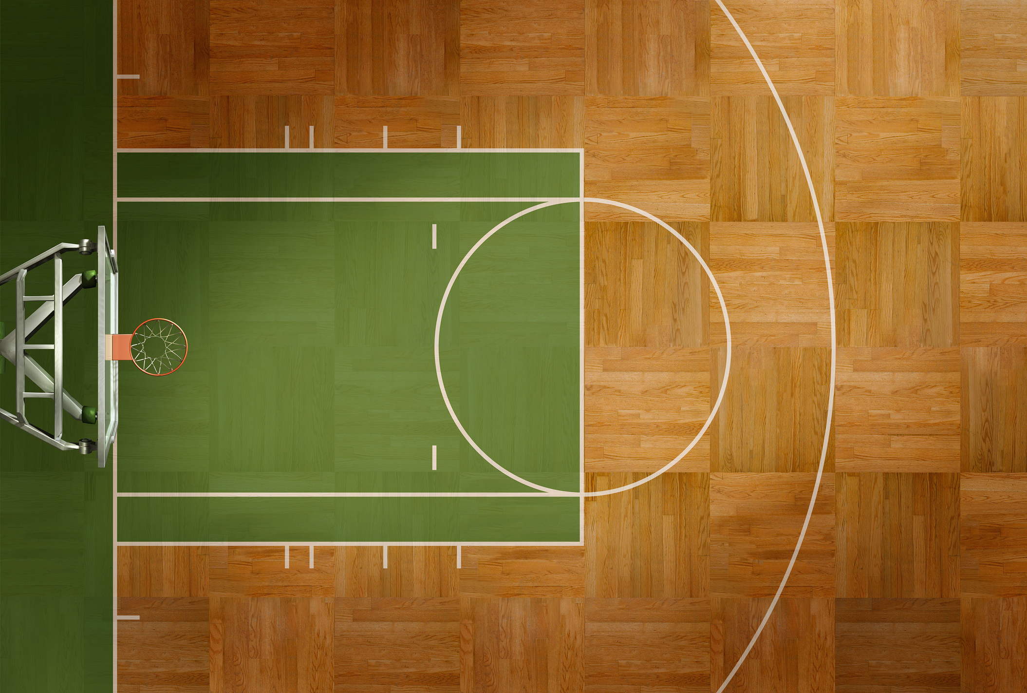 Aerial view of an empty basketball court with clear markings for boundaries and the center circle