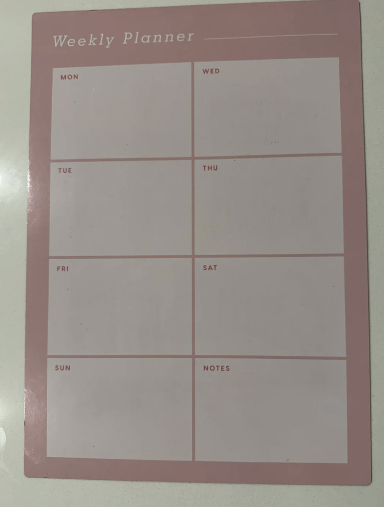 Blank weekly planner with days of the week from Monday to Sunday and a section for notes