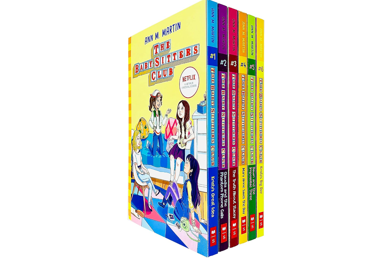 "The Baby-Sitters Club" books series by Ann M. Martin displayed in a boxed set, with titles and illustrations visible