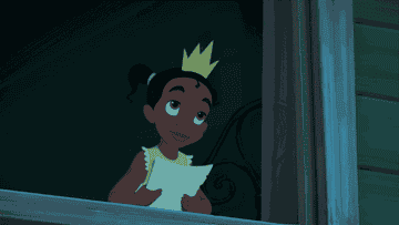 Princess Tiana from Disney&#x27;s &quot;The Princess and the Frog&quot; looking at a letter with a hopeful expression