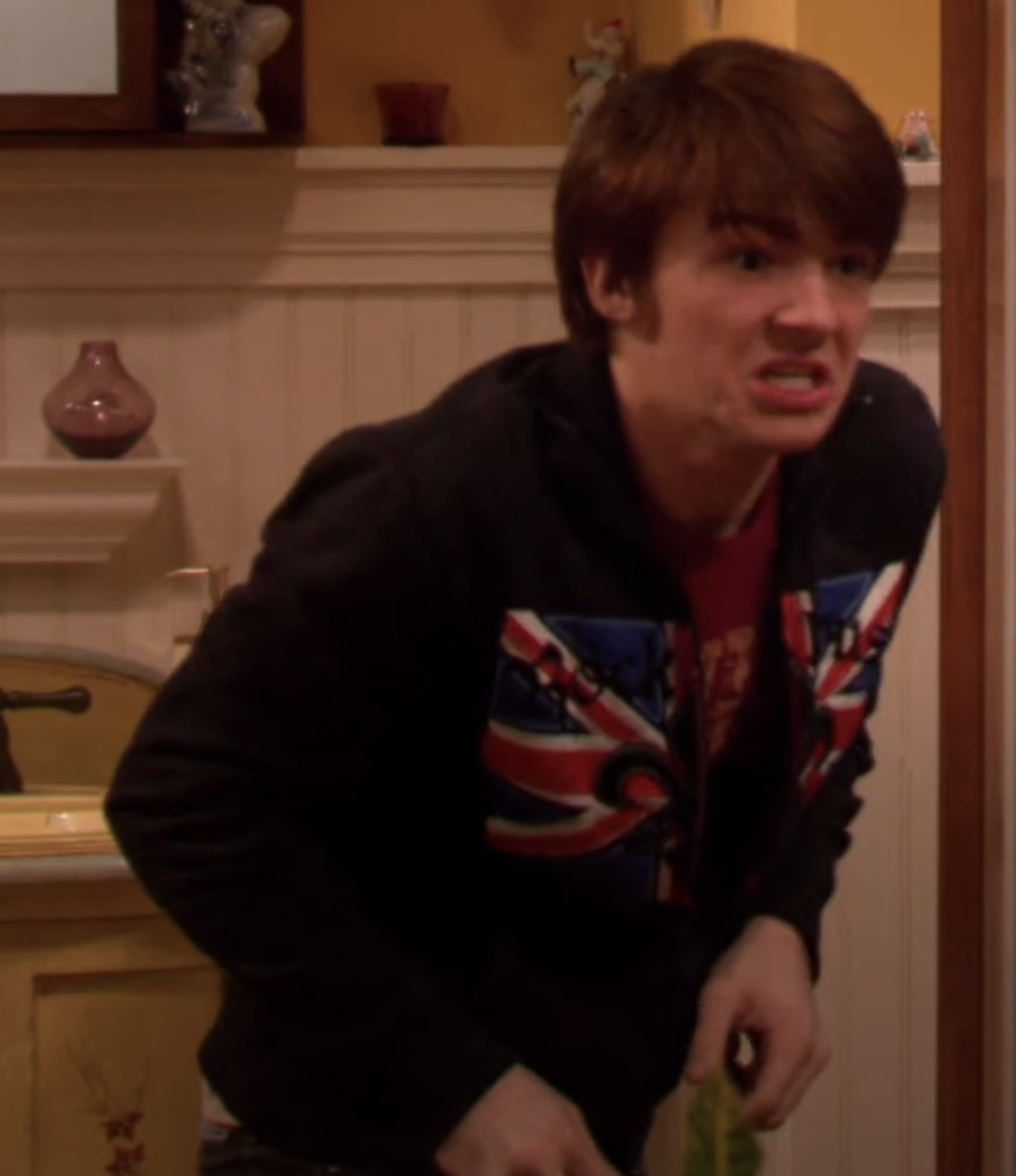 Drake Bell from &quot;Drake &amp;amp; Josh&quot;  looking upset in a kitchen scene