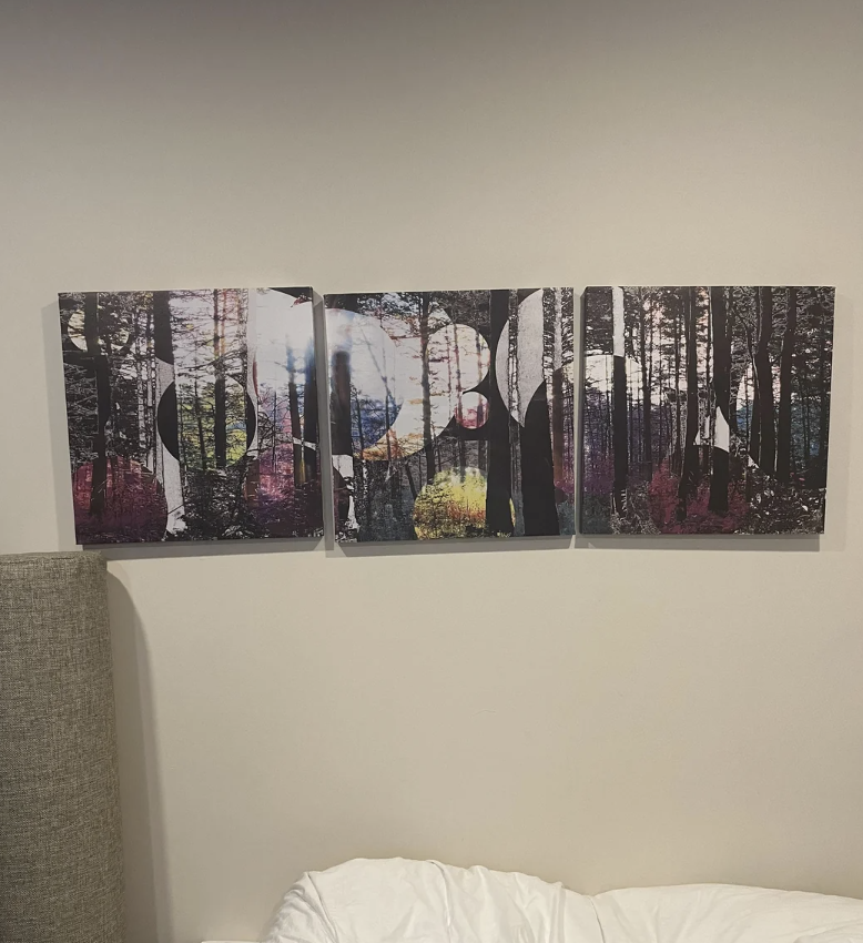 Five-panel wall art of a forest scene above a bed, split across separate canvases