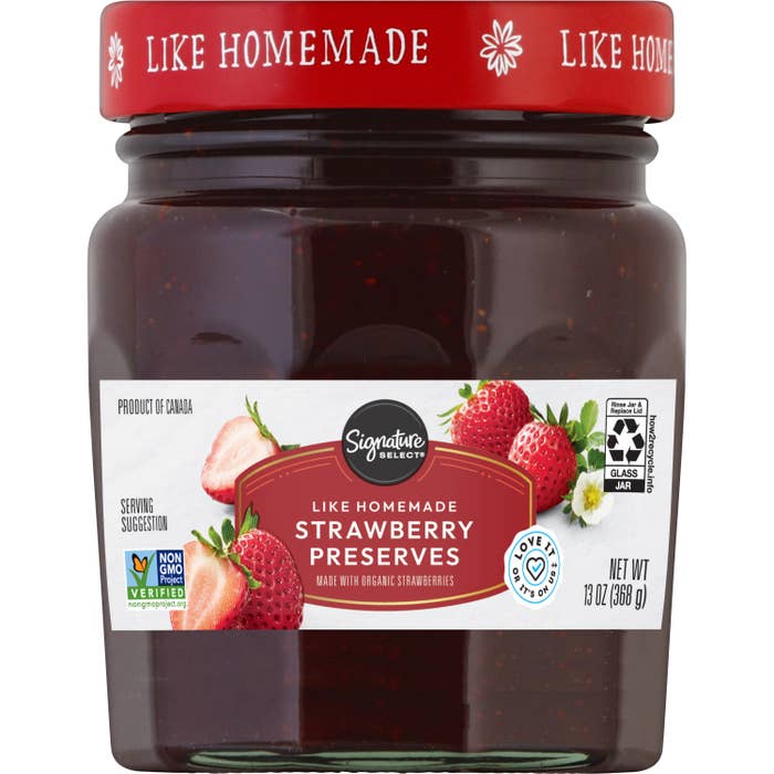 Strawberry preserves jar from Signature Select with organic certification and non-GMO verified label