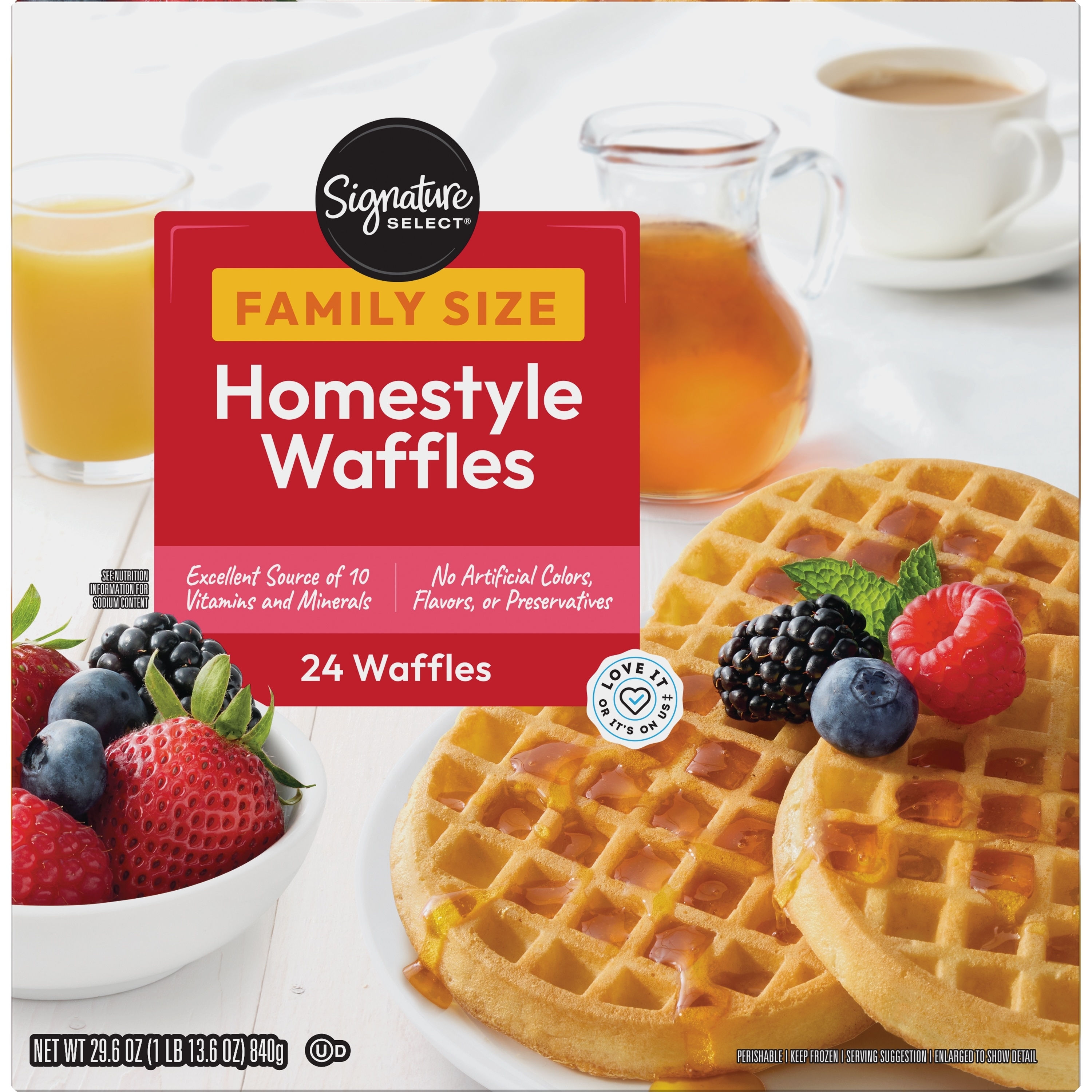 Packaging of Signature Select Homestyle Waffles with a plate of waffles and fruit, orange juice, and coffee in the background
