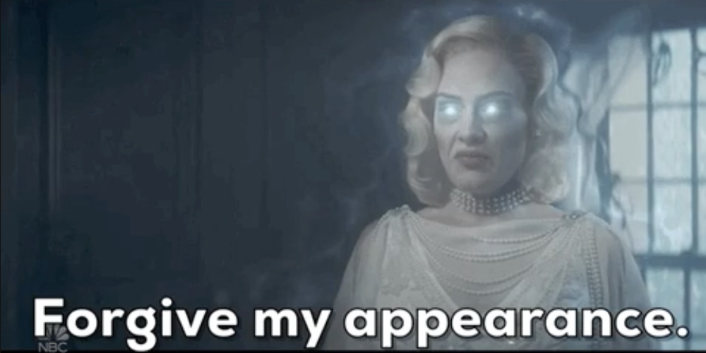 Caption reads &quot;Forgive my appearance&quot; with a glowing-eyed woman in vintage attire on screen