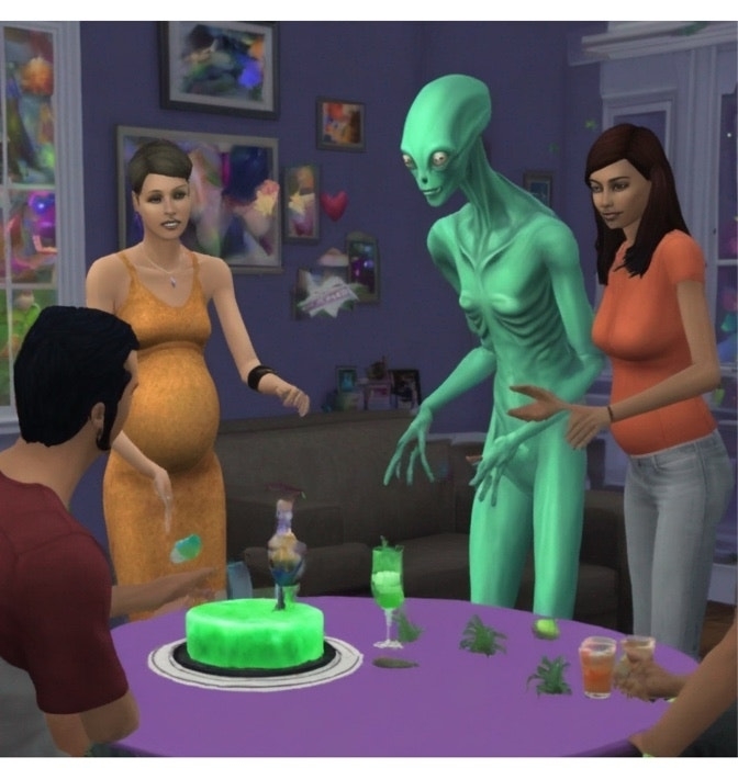 Three Sims characters celebrate with an alien at a birthday party, featuring a cake on the table