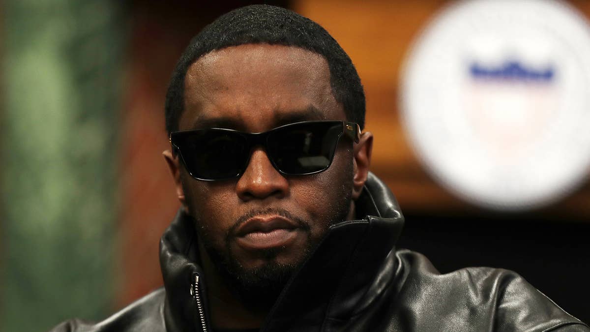 The man does not live right next to Diddy but does reside in the same neighborhood, his mother says.