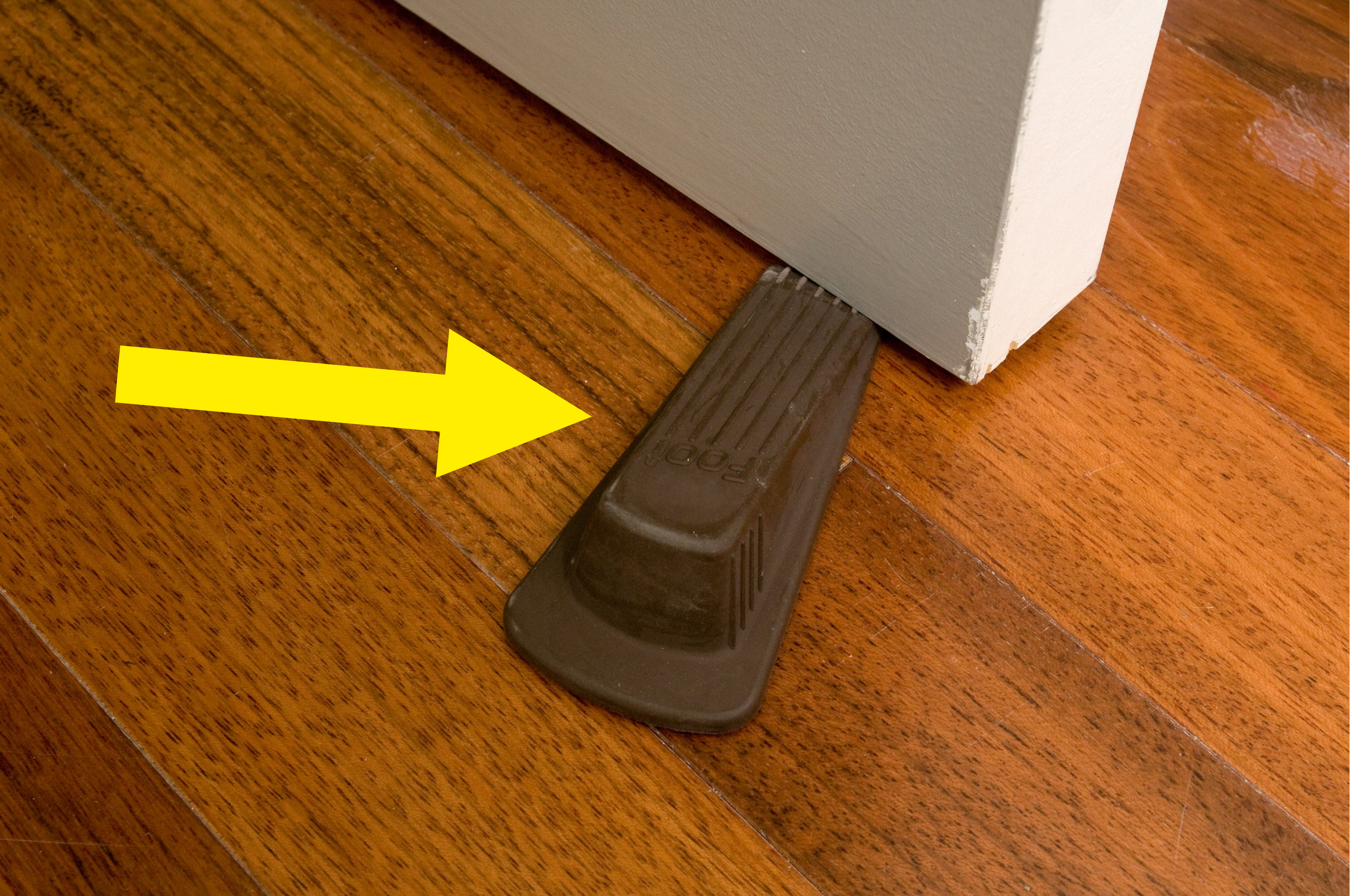 Doorstop securing an open door, relating to the practical aspects of travel accommodations