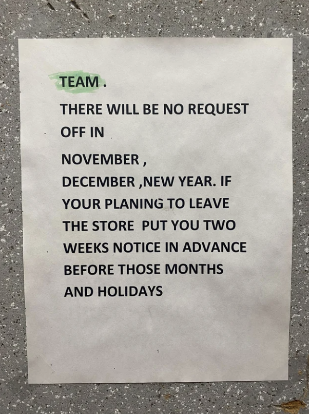 Sign on wall stating no time off requests in November, December, or before holidays; plan two weeks in advance