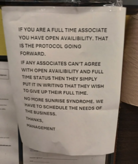 Sign at a workplace discussing full-time associate availability and scheduling policy