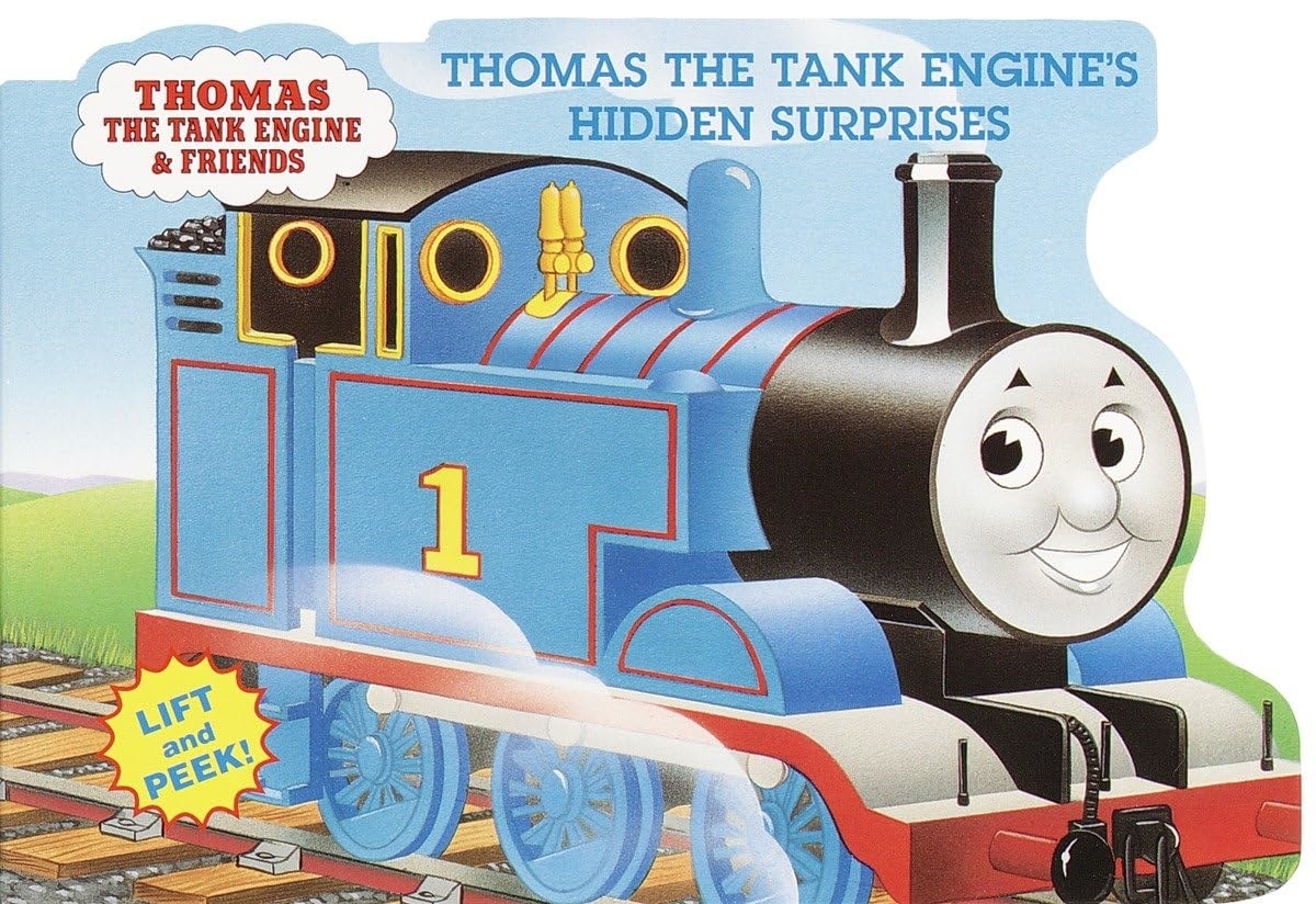 A cover of &quot;Thomas the Tank Engine&#x27;s Hidden Surprises&quot; book with a smiling Thomas and interactive flaps