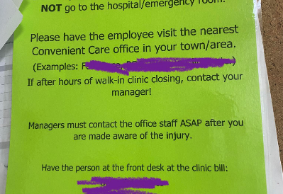 Notice on bulletin board about emergency room procedures for employees, with specific instructions and contact information, partially obscured by purple mark