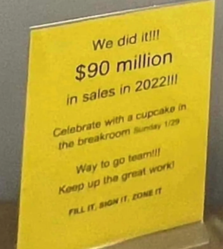 Sign celebrating $90 million in sales for 2022, invites to celebrate with a sundae in the breakroom on 1/29, and encourages team&#x27;s good work