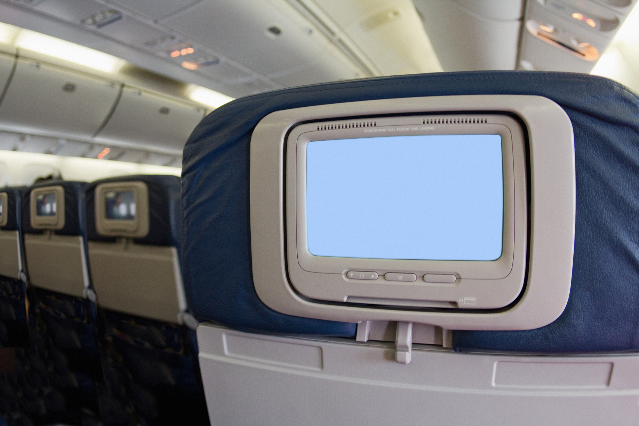 Seatback in-flight entertainment screen turned off on an airplane