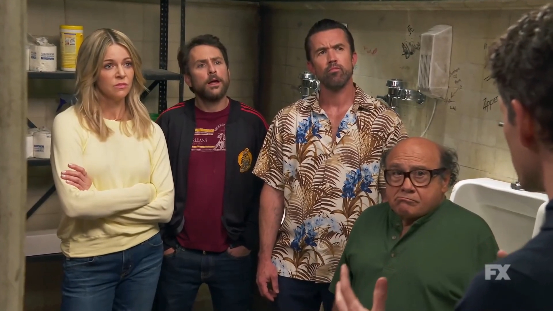 Four characters from &quot;It&#x27;s Always Sunny in Philadelphia&quot; look surprised in a bar setting