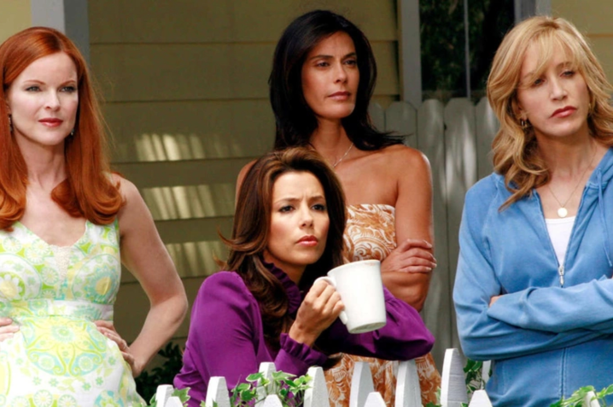 Eva Longoria, Marcia Cross, and others in casual attire on the set of &quot;Desperate Housewives.&quot;