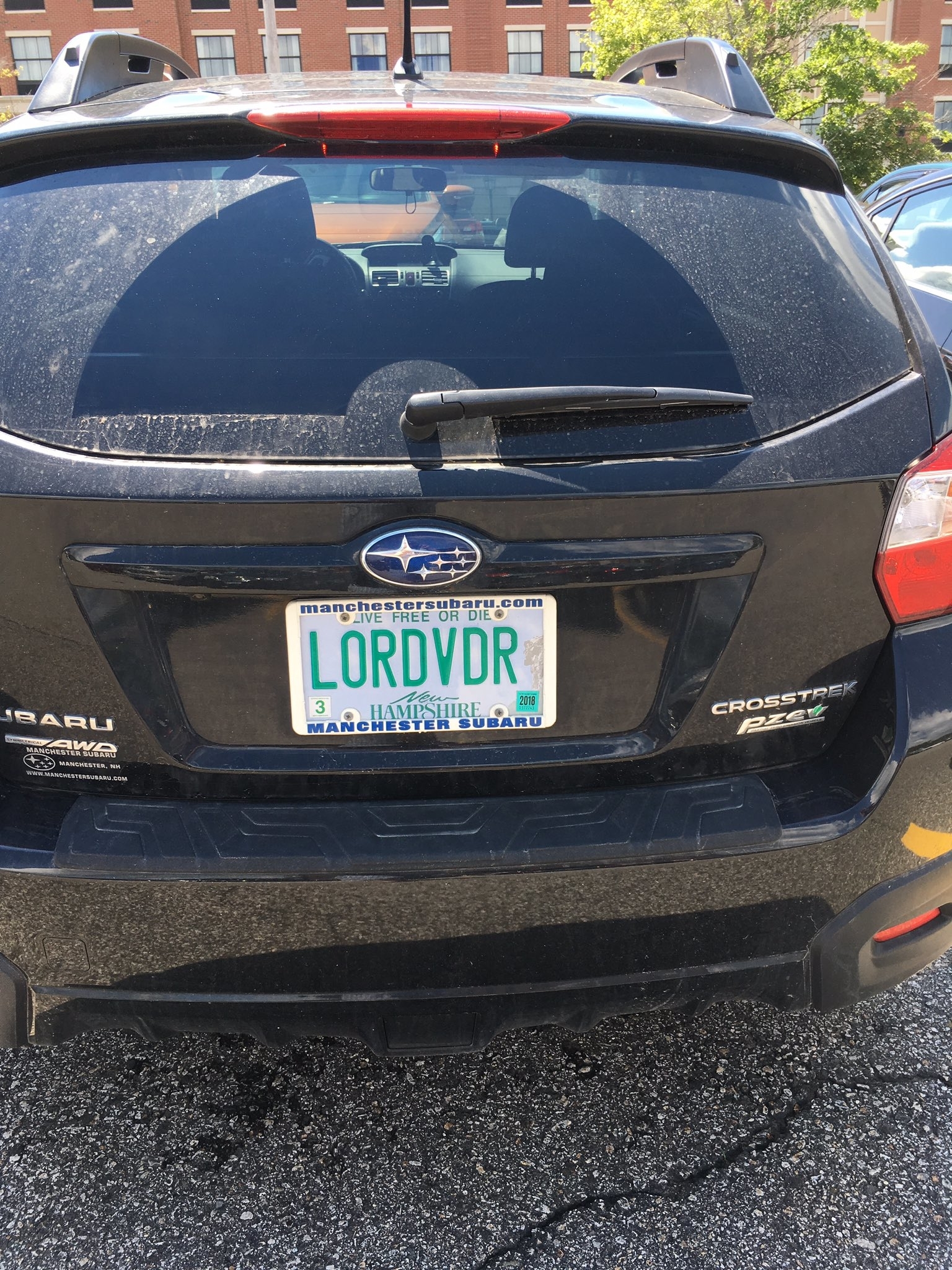 Car with license plate reading &quot;LORDVDR.&quot;