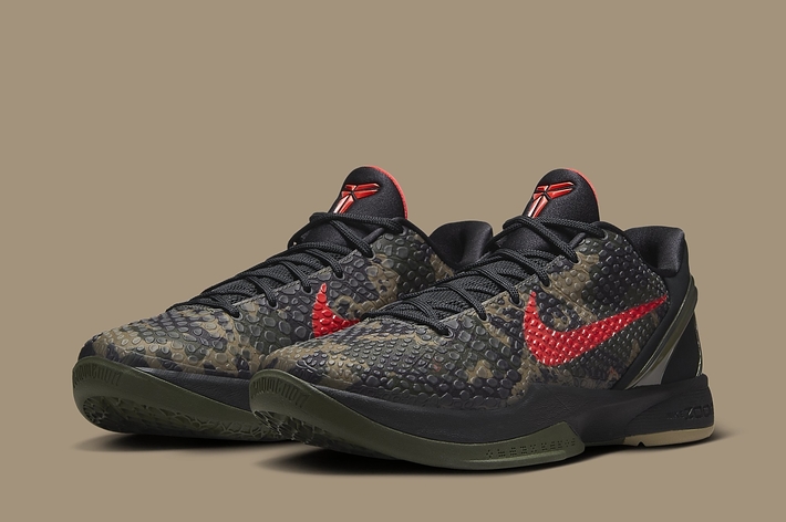 Pair of Nike Kobe 6 Protro "Camo" sneakers with a camouflage pattern and red Nike swoosh logo