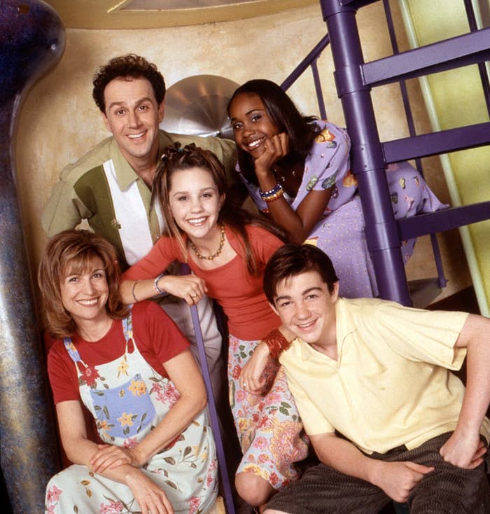 Group pose with actors from &quot;Even Stevens&quot; TV show, smiling in a household setting