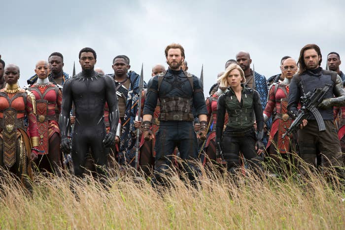 Marvel&#x27;s Avengers characters standing together in a battle stance in Wakanda