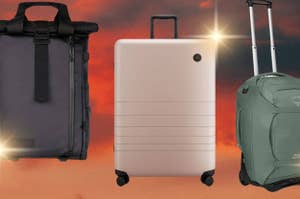 Three various styles of luggage displayed against an orange backdrop