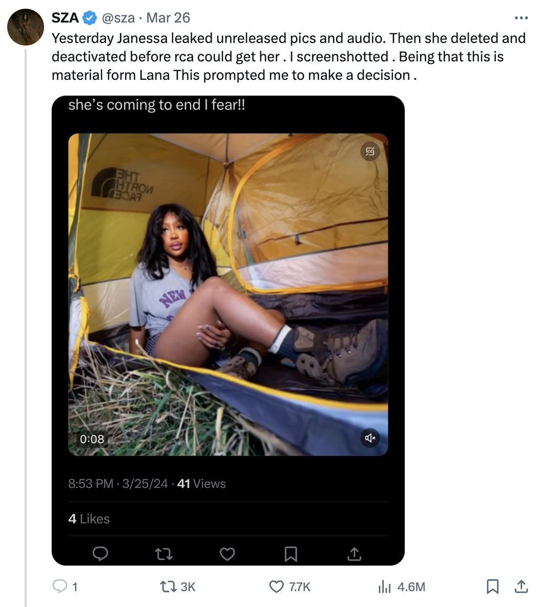 SZA sitting inside a tent looking at the camera, with a bemused expression and text overlay from a tweet
