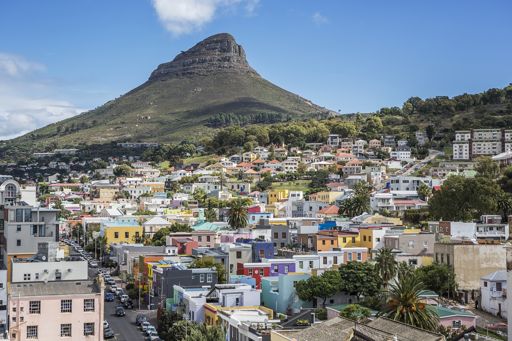 Colorful houses in the Bo-Kaap district with Signal Hill in the background