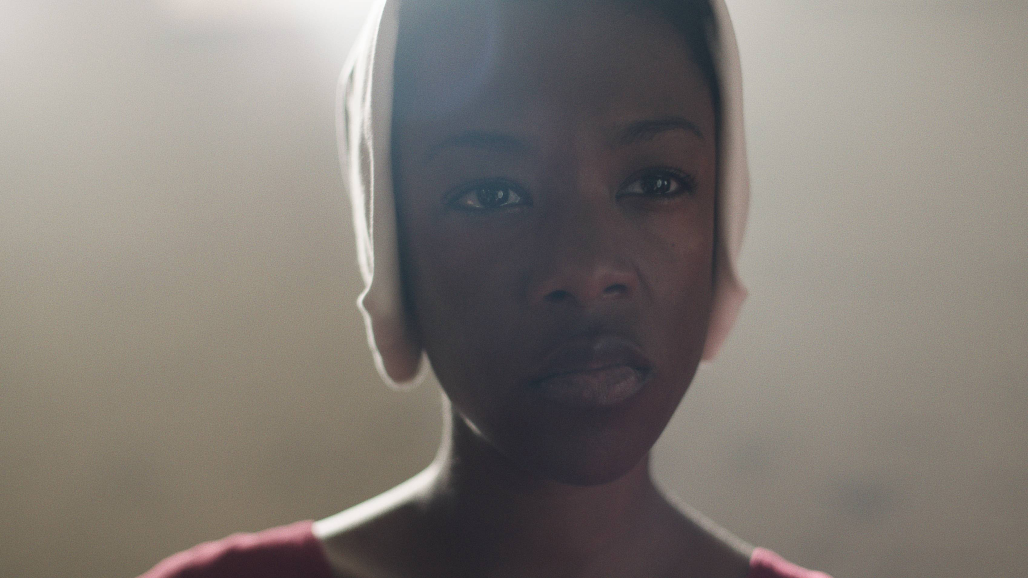 Portrait of a Samira Wiley in The Handmaid&#x27;s Tale looking directly at the camera with a neutral expression