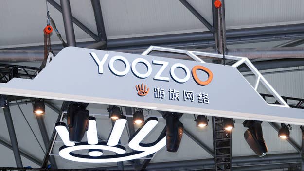 YOOZOO company logo sign displayed at an event