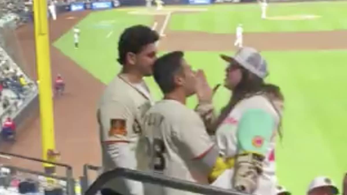 The female Padres fan delivered a slap heard 'round the world at Friday night's game.