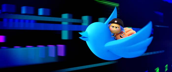 Animated characters from the game series &quot;Street Fighter,&quot; Ryu and Chun-Li, riding the Twitter logo above digital graphs