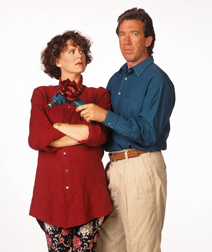 Sigourney Weaver and Tim Allen in promotional photo for "Galaxy Quest," Weaver in a red shirt, Allen in a blue one