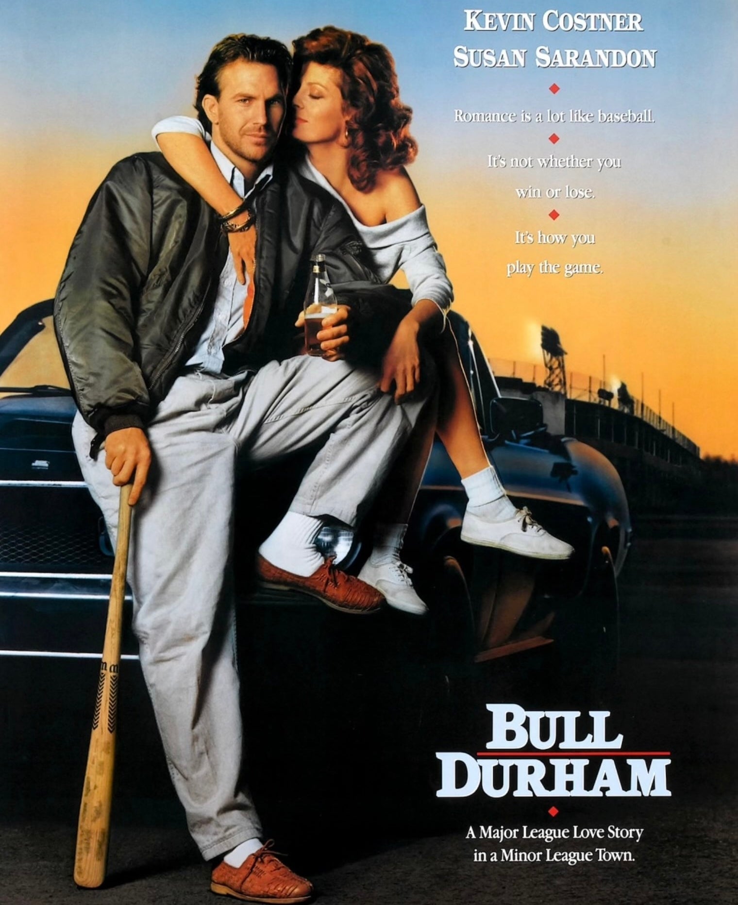 Movie poster of &quot;Bull Durham&quot; with Kevin Costner and Susan Sarandon leaning on a car. Costner holds a bat; Sarandon, a drink