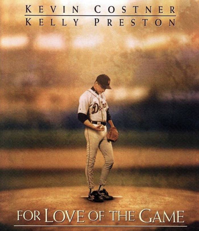 Movie poster for "For Love of the Game" with Kevin Costner holding a baseball, with dramatic lighting.