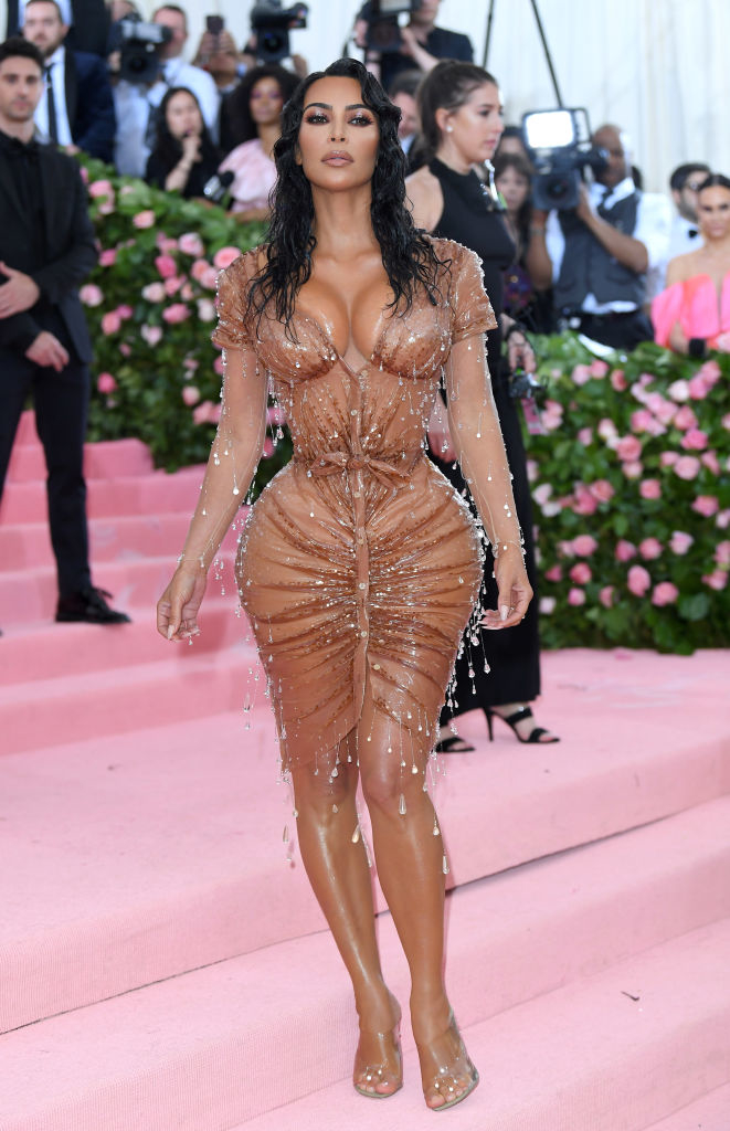 Kim Kardashian in a wet-look dress with crystal droplets at a gala event