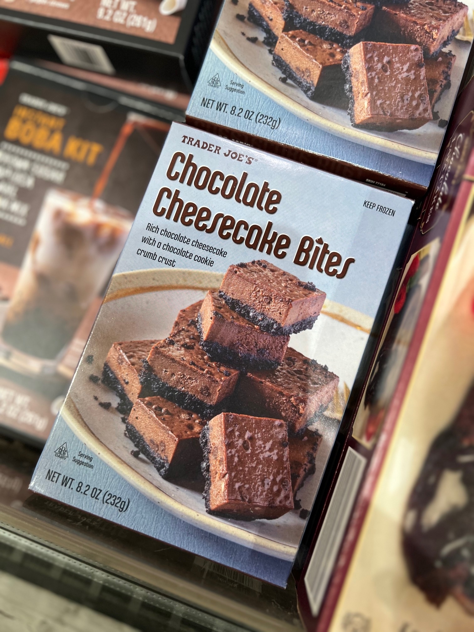Box of Trader Joe&#x27;s Chocolate Cheesecake Bites with image of dessert on packaging