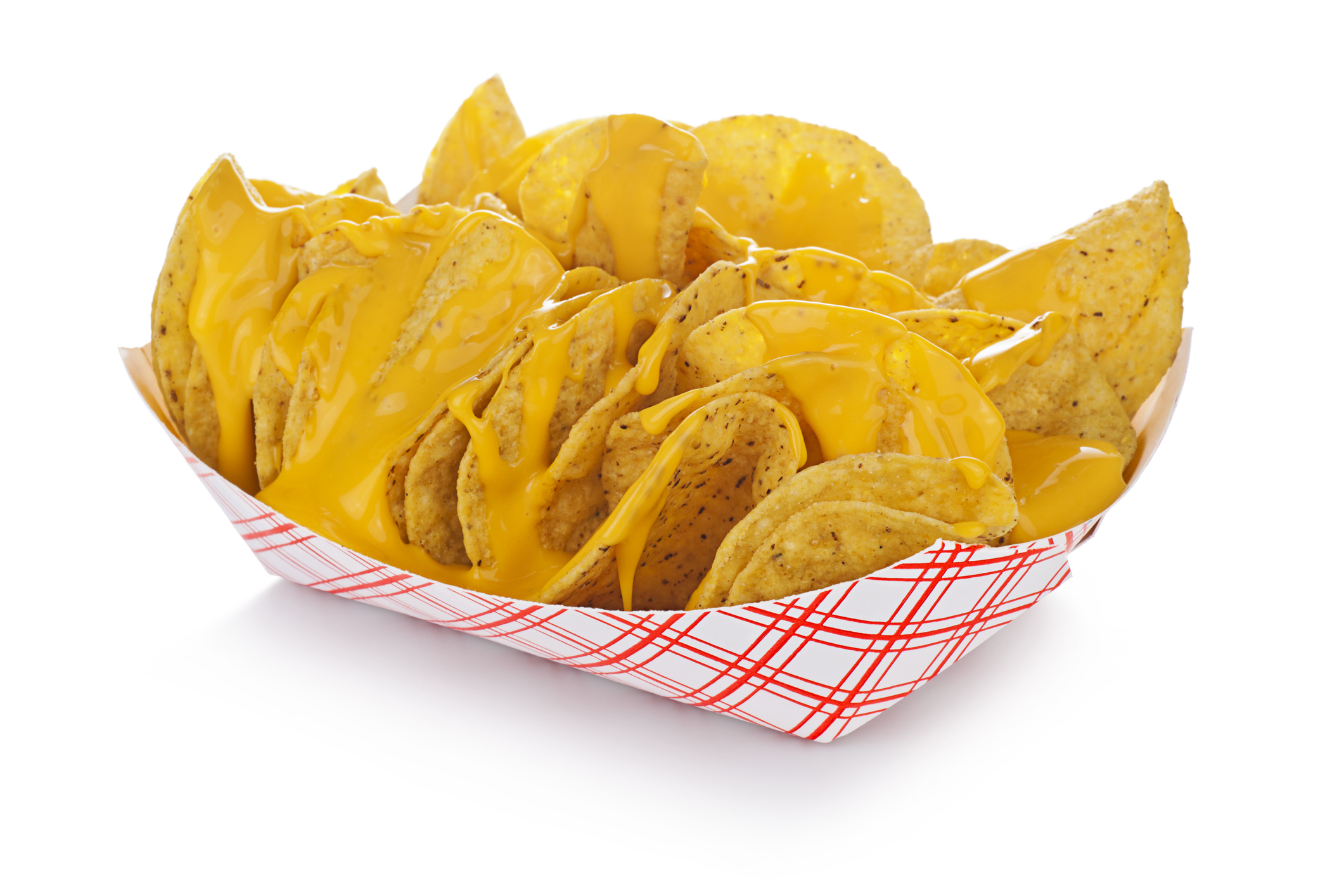 A basket of tortilla chips covered in melted cheese