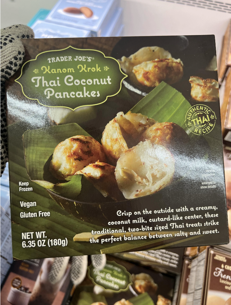 Trader Joe&#x27;s packaging for Khao Nom Krook Thai Coconut Pancakes highlighting vegan, gluten-free features with a serving suggestion image