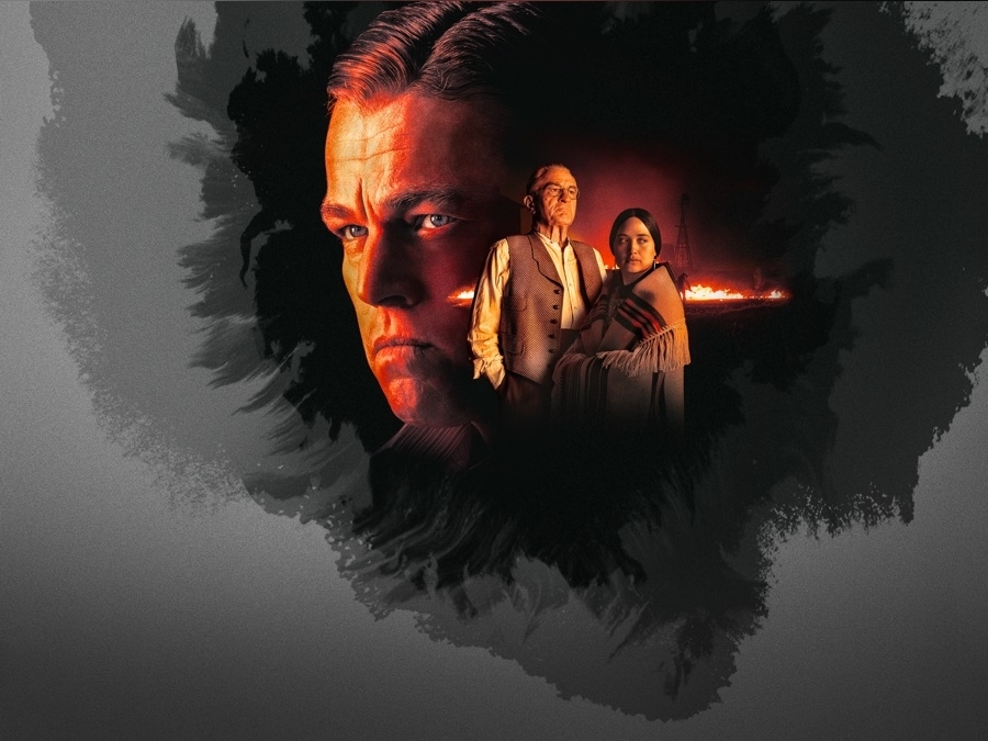 Imagen promocional con los personajes Leonardo DiCaprio y Jennifer Lawrence de una película. El fondo muestra efectos de fuego y sombras