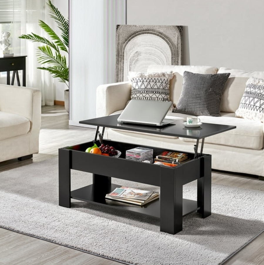Modern living room with a lift-top coffee table, sofa, and decorative items