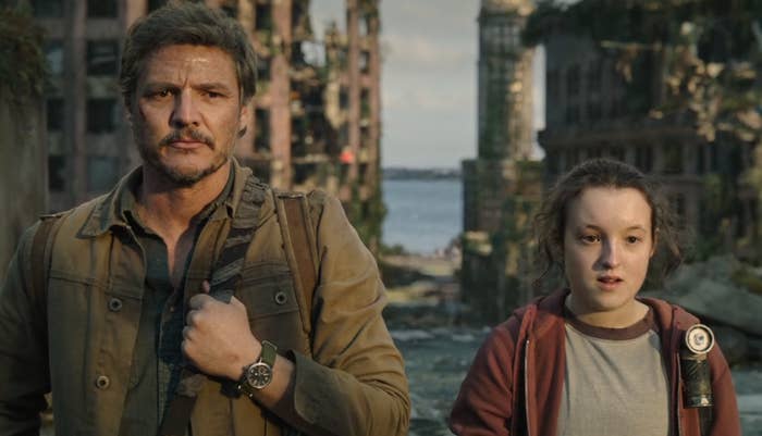 Pedro Pascal and Bella Ramsey stand in a post-apocalyptic setting for &quot;The Last of Us&quot; series