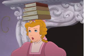 Cinderella balancing books on her head.