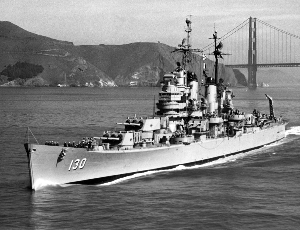 US Navy battleship sailing past the Golden Gate bridge