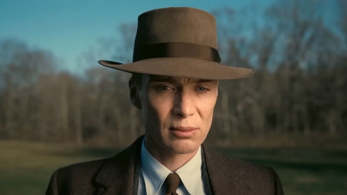 Character wearing a vintage hat and coat, looking pensive