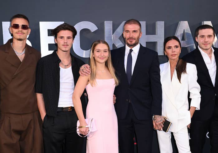 David Beckham and family posing at an event