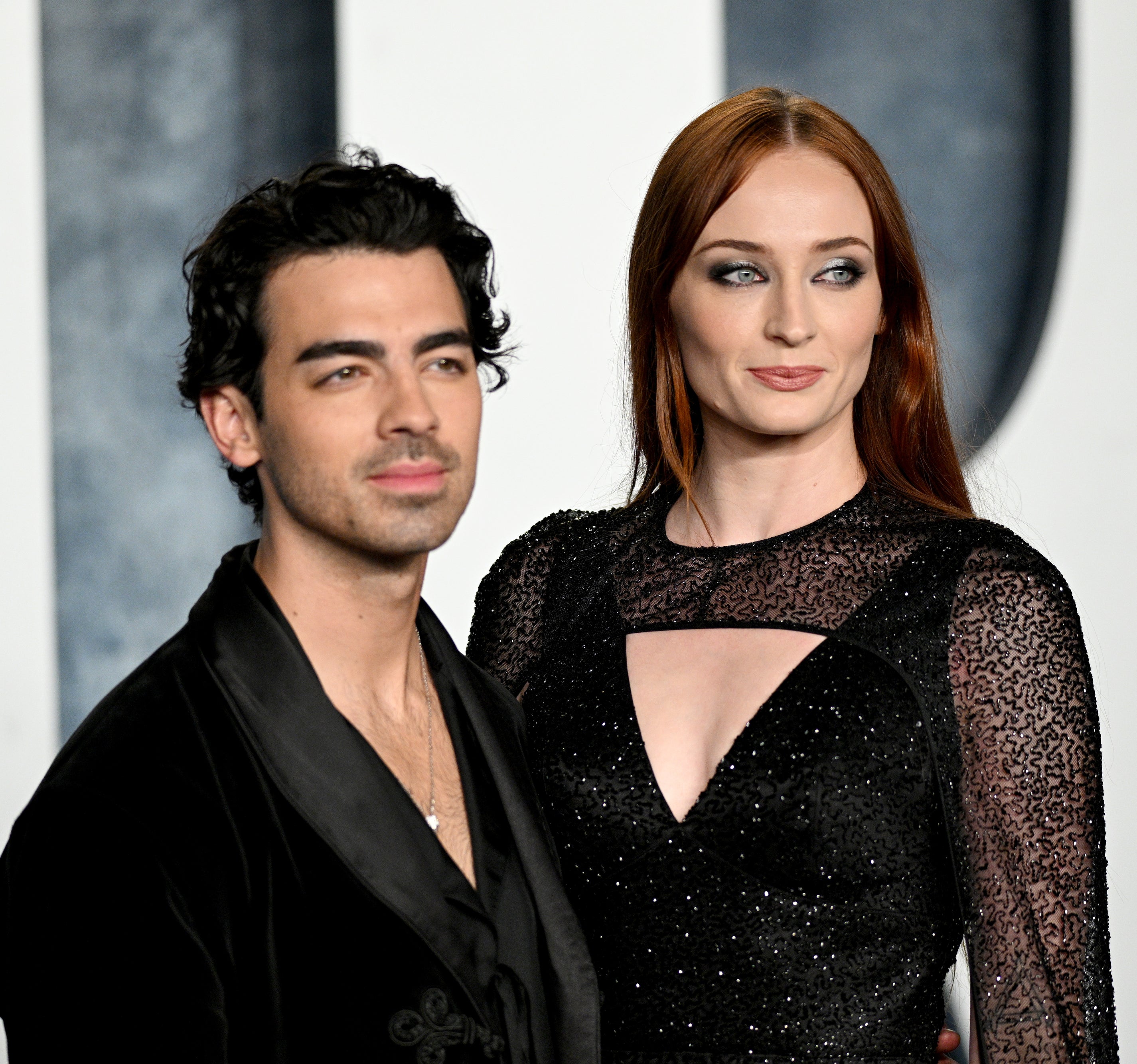 Joe and Sophie posing for photographers on the red carpet