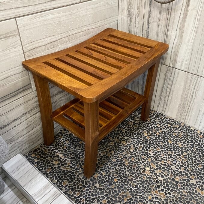 Wooden shower bench with slatted design
