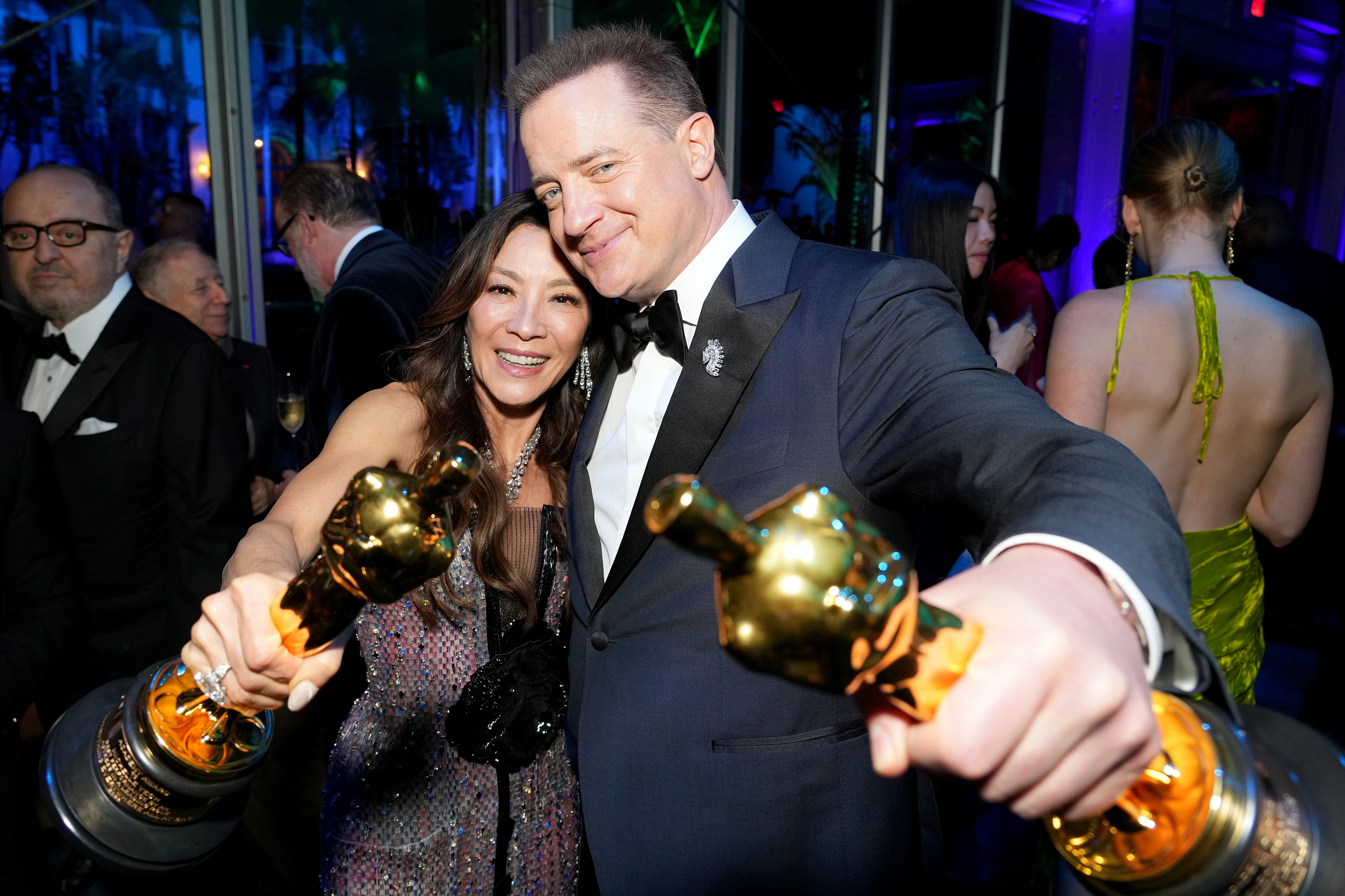 Michelle Yeoh and Brandan Fraser with their Oscars